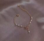 Brazaletes con dijes en diferentes colores - Image 5