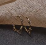 Aretes de aros con cadena