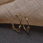 Aretes de aros con cadena