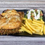 Plato del día con pescado al ajillo